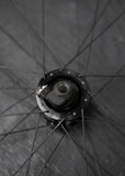 Dynamo Wheel; Road/Gravel Disc Thru Axle Tubeless i18 Rim 